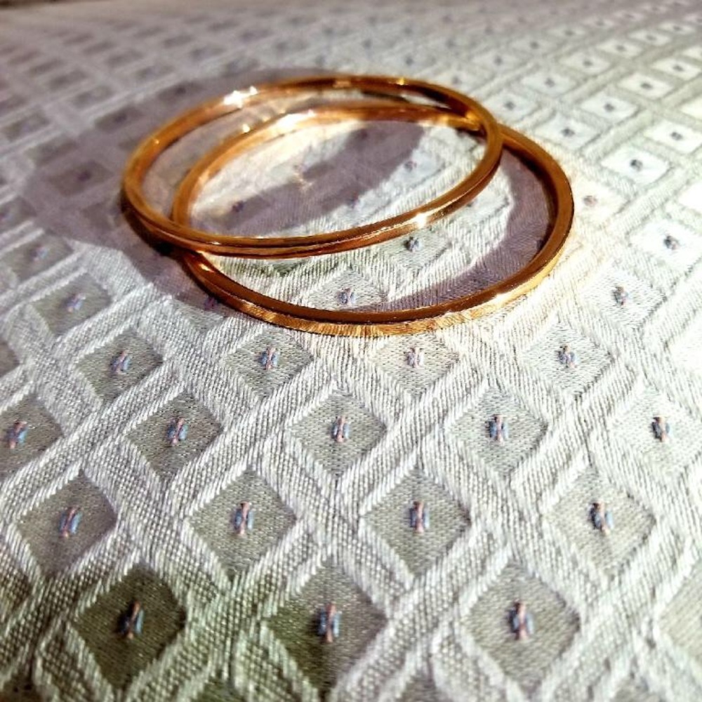 Rose gold bronze bangles.